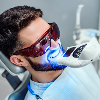 a patient receiving cosmetic dental bonding
