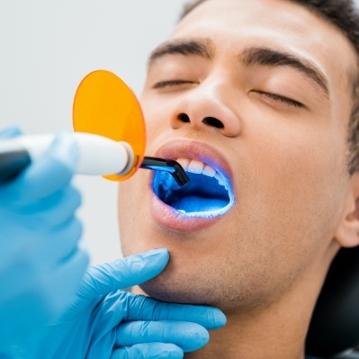 Patient receiving cosmetic dental bonding treatment