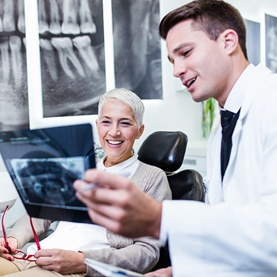 Woman talking to her dentist