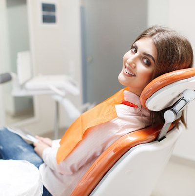 Smiling woman in dental chair