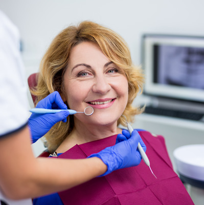 a dental implant patient smiling