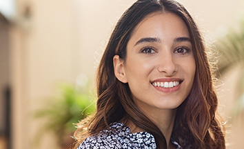 Woman with gorgeous smile after cosmetic dentistry