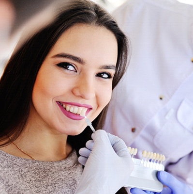 Patient smiling during consultation with Worcester cosmetic dentist
